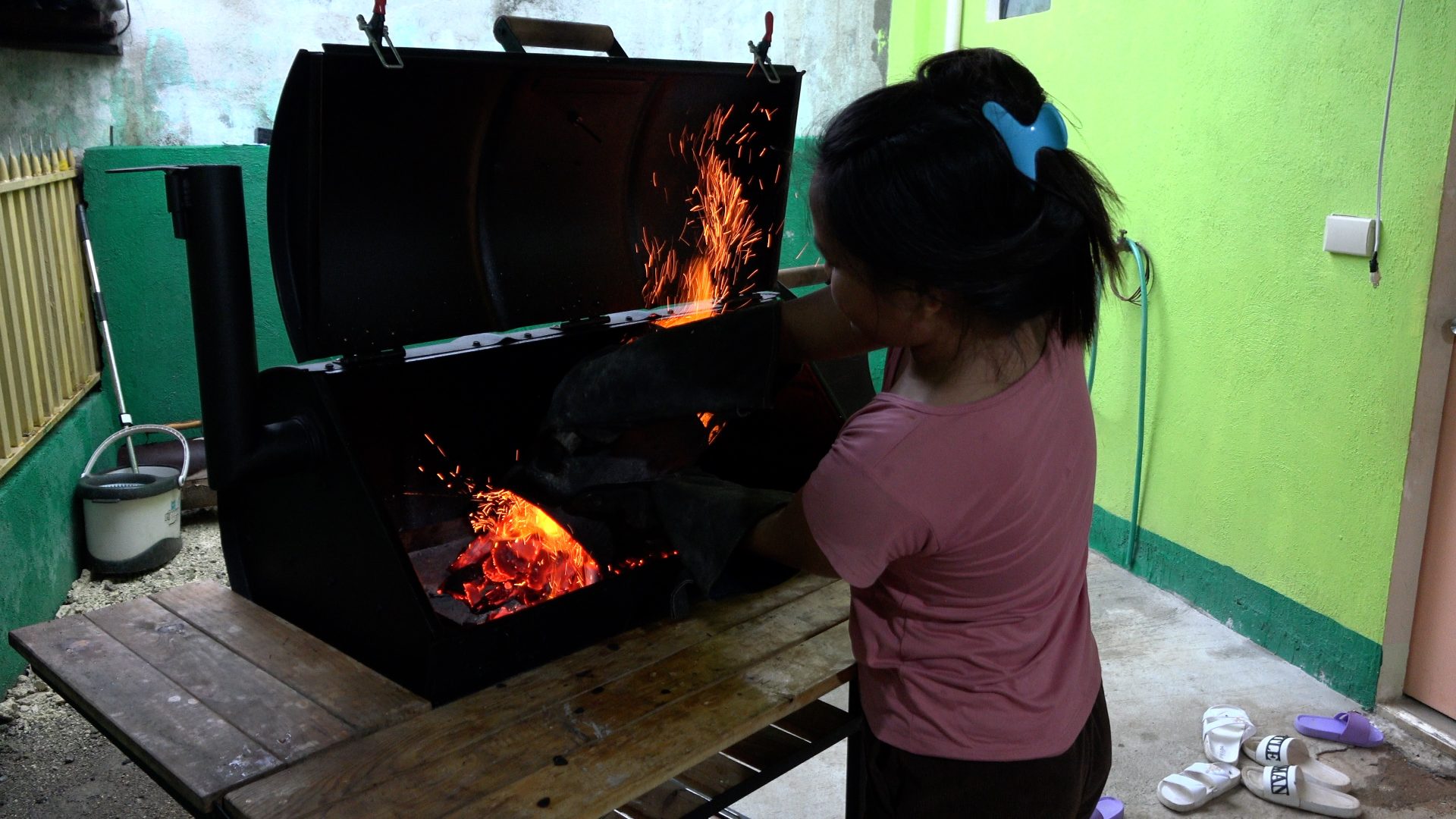 Filipina Wife Cooks Barbecue Pork on the Grill