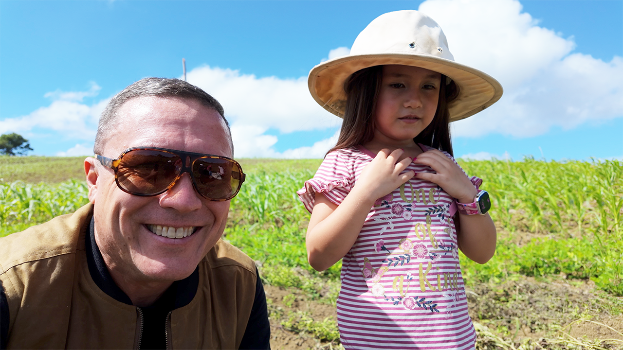 Maria and Dad in Grandma's Cornfield Basecamp and Truck Patch